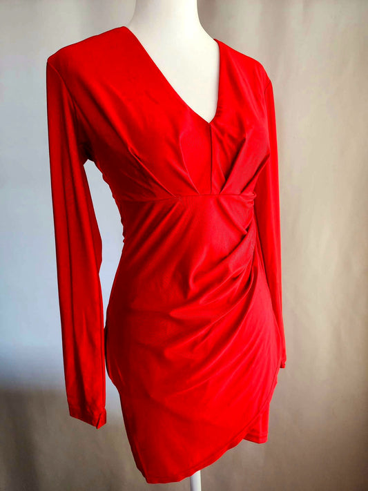 Red long-sleeved dress with V-neckline