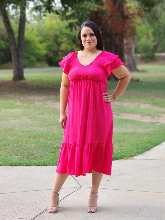 Vestido midi fucsia con cuello en V
