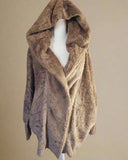 Brown textured scarf on a mannequin against a white background